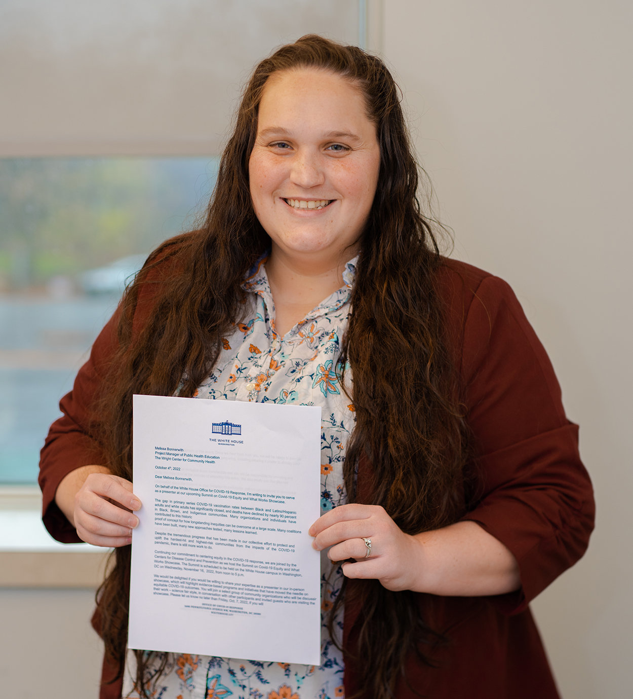 Melissa Bonnerwith, project manager of public health education and AmeriCorps VISTA at the Wright Center, delivered the poster presentation during the Summit on COVID-19 Equity and What Works event at the White House Eisenhower executive office building...